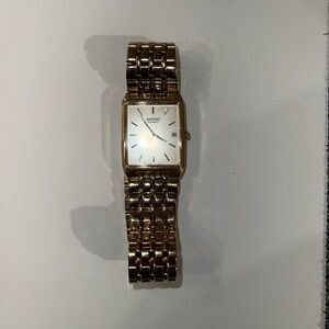 Seiko Gold Timepiece with Silver Accents